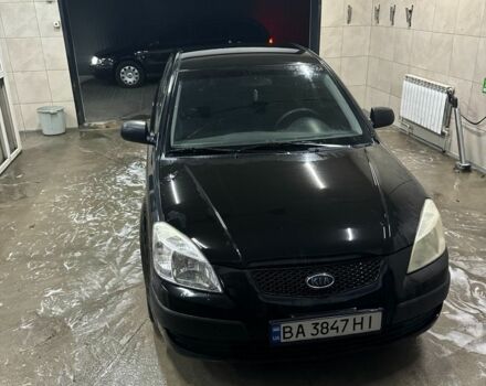 Чорний Кіа Ріо, об'ємом двигуна 1.4 л та пробігом 215 тис. км за 3112 $, фото 6 на Automoto.ua