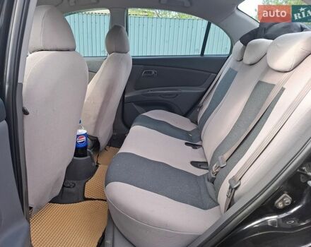 Черный Киа Рио, объемом двигателя 1.4 л и пробегом 156 тыс. км за 4800 $, фото 6 на Automoto.ua