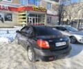 Чорний Кіа Ріо, об'ємом двигуна 1.4 л та пробігом 230 тис. км за 3750 $, фото 3 на Automoto.ua