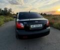 Чорний Кіа Ріо, об'ємом двигуна 1.4 л та пробігом 168 тис. км за 5500 $, фото 3 на Automoto.ua