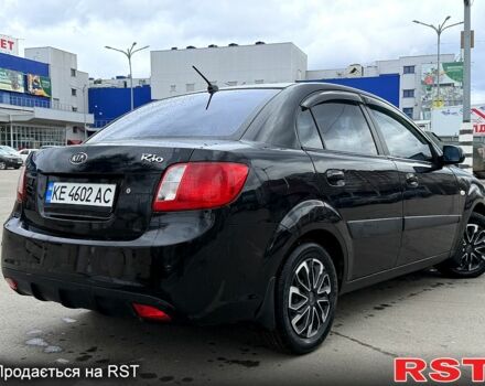 Чорний Кіа Ріо, об'ємом двигуна 1.4 л та пробігом 220 тис. км за 4700 $, фото 6 на Automoto.ua