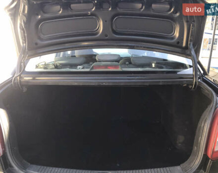 Черный Киа Рио, объемом двигателя 1.4 л и пробегом 291 тыс. км за 5500 $, фото 20 на Automoto.ua