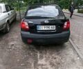 Черный Киа Рио, объемом двигателя 1.4 л и пробегом 260 тыс. км за 3800 $, фото 1 на Automoto.ua