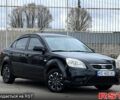 Чорний Кіа Ріо, об'ємом двигуна 1.4 л та пробігом 220 тис. км за 4700 $, фото 1 на Automoto.ua