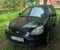 Чорний Кіа Ріо, об'ємом двигуна 1.4 л та пробігом 260 тис. км за 3900 $, фото 1 на Automoto.ua