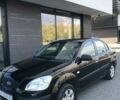 Черный Киа Рио, объемом двигателя 1.4 л и пробегом 291 тыс. км за 4200 $, фото 4 на Automoto.ua