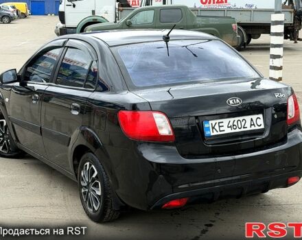 Чорний Кіа Ріо, об'ємом двигуна 1.4 л та пробігом 220 тис. км за 4700 $, фото 3 на Automoto.ua