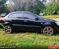 Черный Киа Рио, объемом двигателя 1.4 л и пробегом 145 тыс. км за 4300 $, фото 9 на Automoto.ua
