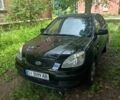 Черный Киа Рио, объемом двигателя 1.4 л и пробегом 260 тыс. км за 3800 $, фото 1 на Automoto.ua