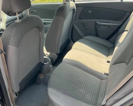 Черный Киа Рио, объемом двигателя 1.4 л и пробегом 146 тыс. км за 4350 $, фото 7 на Automoto.ua