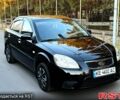 Черный Киа Рио, объемом двигателя 1.4 л и пробегом 224 тыс. км за 4999 $, фото 1 на Automoto.ua