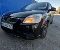 Черный Киа Рио, объемом двигателя 1.4 л и пробегом 220 тыс. км за 4400 $, фото 1 на Automoto.ua