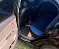 Черный Киа Рио, объемом двигателя 1.4 л и пробегом 145 тыс. км за 4300 $, фото 4 на Automoto.ua