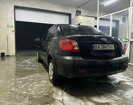 Чорний Кіа Ріо, об'ємом двигуна 1.4 л та пробігом 215 тис. км за 3112 $, фото 4 на Automoto.ua