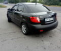 Черный Киа Рио, объемом двигателя 1.4 л и пробегом 85 тыс. км за 6000 $, фото 1 на Automoto.ua