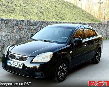 Черный Киа Рио, объемом двигателя 1.4 л и пробегом 224 тыс. км за 4999 $, фото 2 на Automoto.ua