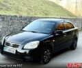 Черный Киа Рио, объемом двигателя 1.4 л и пробегом 224 тыс. км за 4999 $, фото 2 на Automoto.ua