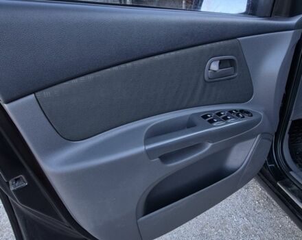 Черный Киа Рио, объемом двигателя 1.4 л и пробегом 220 тыс. км за 4400 $, фото 10 на Automoto.ua