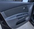 Черный Киа Рио, объемом двигателя 1.4 л и пробегом 220 тыс. км за 4400 $, фото 10 на Automoto.ua