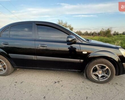 Чорний Кіа Ріо, об'ємом двигуна 1.4 л та пробігом 168 тис. км за 5500 $, фото 12 на Automoto.ua