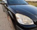 Черный Киа Рио, объемом двигателя 1.4 л и пробегом 168 тыс. км за 5600 $, фото 11 на Automoto.ua