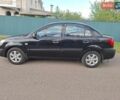 Черный Киа Рио, объемом двигателя 1.4 л и пробегом 156 тыс. км за 4800 $, фото 2 на Automoto.ua