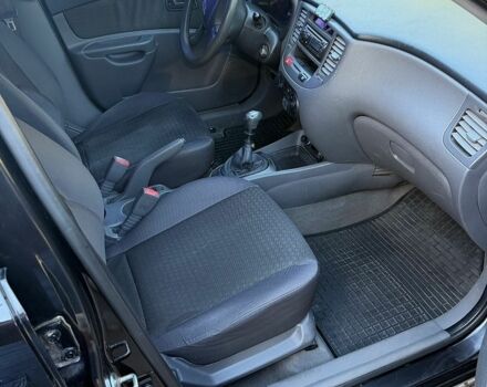 Черный Киа Рио, объемом двигателя 1.4 л и пробегом 218 тыс. км за 3500 $, фото 9 на Automoto.ua