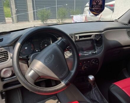Чорний Кіа Ріо, об'ємом двигуна 1.5 л та пробігом 259 тис. км за 4400 $, фото 4 на Automoto.ua
