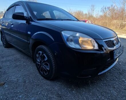 Черный Киа Рио, объемом двигателя 1.4 л и пробегом 220 тыс. км за 4400 $, фото 2 на Automoto.ua