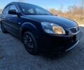 Черный Киа Рио, объемом двигателя 1.4 л и пробегом 220 тыс. км за 4400 $, фото 2 на Automoto.ua