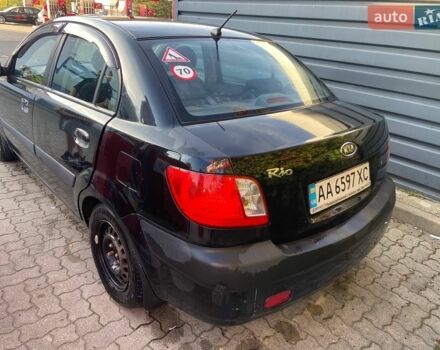 Чорний Кіа Ріо, об'ємом двигуна 1.4 л та пробігом 220 тис. км за 4500 $, фото 3 на Automoto.ua