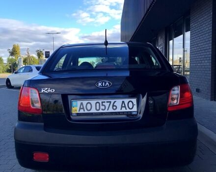 Чорний Кіа Ріо, об'ємом двигуна 1.4 л та пробігом 291 тис. км за 4200 $, фото 4 на Automoto.ua