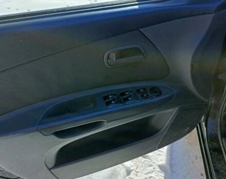 Черный Киа Рио, объемом двигателя 1.4 л и пробегом 259 тыс. км за 4500 $, фото 5 на Automoto.ua