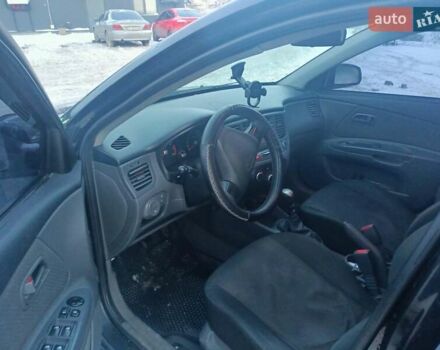 Черный Киа Рио, объемом двигателя 1.4 л и пробегом 273 тыс. км за 3700 $, фото 6 на Automoto.ua