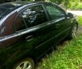 Черный Киа Рио, объемом двигателя 1.4 л и пробегом 260 тыс. км за 3900 $, фото 5 на Automoto.ua