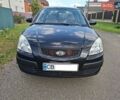 Черный Киа Рио, объемом двигателя 1.4 л и пробегом 156 тыс. км за 4800 $, фото 1 на Automoto.ua