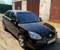 Чорний Кіа Ріо, об'ємом двигуна 1.5 л та пробігом 236 тис. км за 4500 $, фото 1 на Automoto.ua