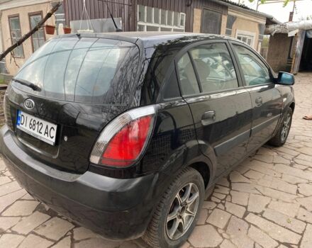 Черный Киа Рио, объемом двигателя 1.4 л и пробегом 250 тыс. км за 3399 $, фото 3 на Automoto.ua