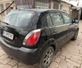 Черный Киа Рио, объемом двигателя 1.4 л и пробегом 250 тыс. км за 3399 $, фото 3 на Automoto.ua