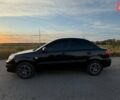 Черный Киа Рио, объемом двигателя 1.4 л и пробегом 168 тыс. км за 5600 $, фото 2 на Automoto.ua