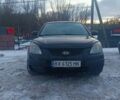 Черный Киа Рио, объемом двигателя 1.4 л и пробегом 273 тыс. км за 3700 $, фото 1 на Automoto.ua