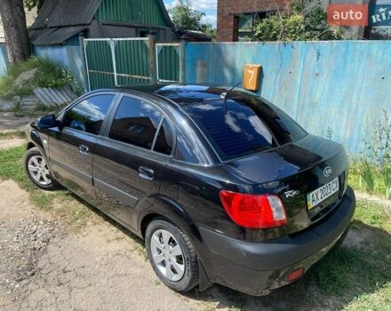 Черный Киа Рио, объемом двигателя 1.4 л и пробегом 214 тыс. км за 4600 $, фото 1 на Automoto.ua