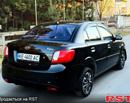 Черный Киа Рио, объемом двигателя 1.4 л и пробегом 224 тыс. км за 4999 $, фото 1 на Automoto.ua