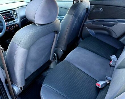 Чорний Кіа Ріо, об'ємом двигуна 1.4 л та пробігом 224 тис. км за 4999 $, фото 10 на Automoto.ua