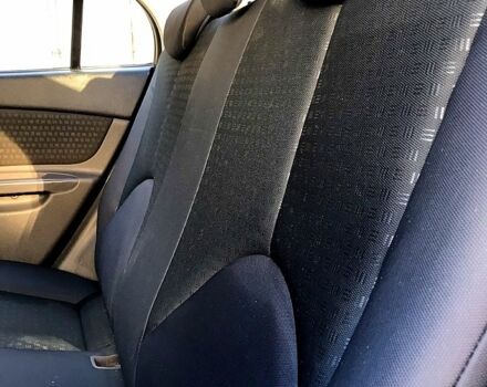 Чорний Кіа Ріо, об'ємом двигуна 1.4 л та пробігом 291 тис. км за 4200 $, фото 9 на Automoto.ua