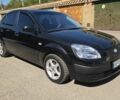 Черный Киа Рио, объемом двигателя 1.5 л и пробегом 239 тыс. км за 4498 $, фото 1 на Automoto.ua