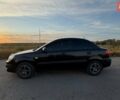 Чорний Кіа Ріо, об'ємом двигуна 1.4 л та пробігом 168 тис. км за 5500 $, фото 2 на Automoto.ua