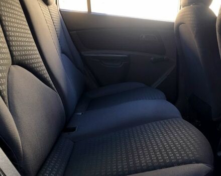 Чорний Кіа Ріо, об'ємом двигуна 1.4 л та пробігом 291 тис. км за 4200 $, фото 8 на Automoto.ua