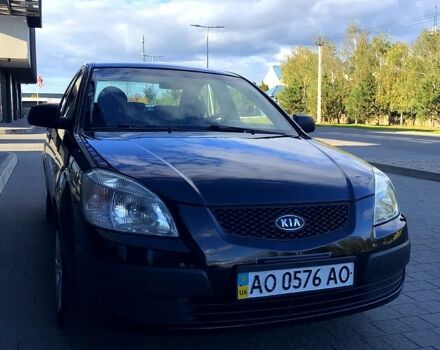 Чорний Кіа Ріо, об'ємом двигуна 1.4 л та пробігом 291 тис. км за 4200 $, фото 2 на Automoto.ua