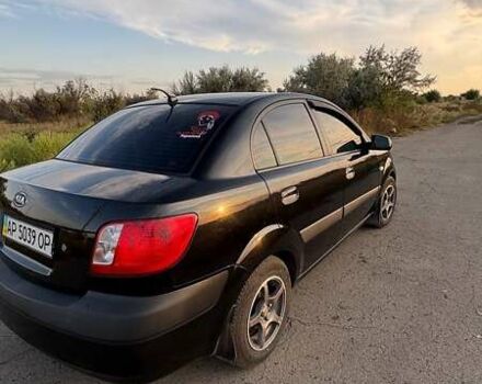 Чорний Кіа Ріо, об'ємом двигуна 1.4 л та пробігом 168 тис. км за 5600 $, фото 5 на Automoto.ua